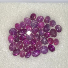 Load and play video in Gallery viewer, Natural Ruby star Sapphires Lot
